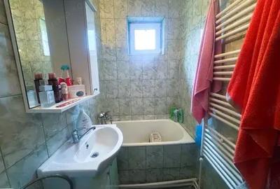 Apartament cu 4 camere decomandat în Drăgănești-Olt - 11