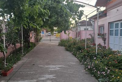Casă cu Teren 1000 Mp în Central