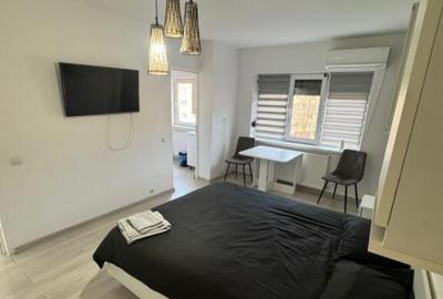 Garsoniera de vanzare, zona centrala - 11