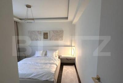 Apartament de lux,2 camere,2 bai,bloc nou,parter +parcare p - 12