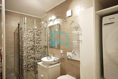 Apartament cu 4 camere decomandat în Tractorul - 21