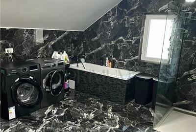 Casa individuala - teren 1000 mp - garaj - 15