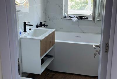 Apartament cu 3 camere decomandat în Lespezi - 2