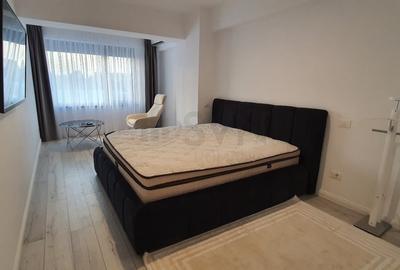 Apartament cu 4 camere semidecomandat, mobilat în Băneasa - 9