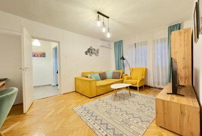 Apartament cu 2 camere semidecomandat, mobilat în Central