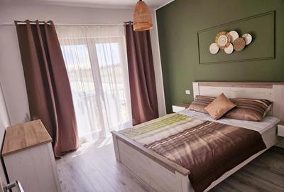 Inchiriez apartament 2 camere si dressing si curte privata + loc de parcare