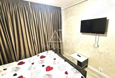 Apartament cu 2 camere decomandat în 9 Mai - 11