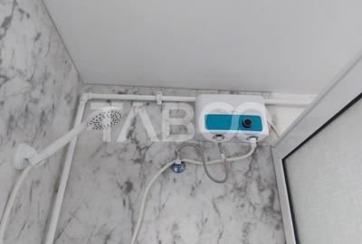 Garsoniera 11 mp renovata total in 2025 etaj 1 baie proprie Cisnadie - 9