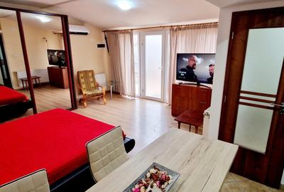 Două apartamente la casă, Simion Bărnuțiu