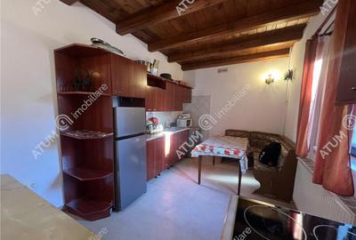 Pensiune de 7 camere cu 5 bai si teren de 377mp situata in P - 7