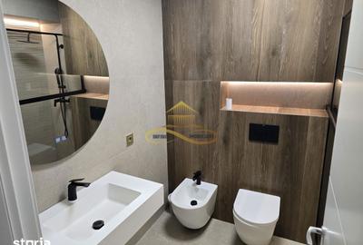 Apartament cu 2 camere decomandat în Dofteana - 1