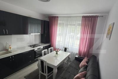 Garsoniera spatioasa zarnesti , stare impecabila . - 2