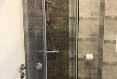 Apartament cu 3 camere decomandat în Tractorul