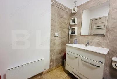 Garsonieră decomandată în Central - 9