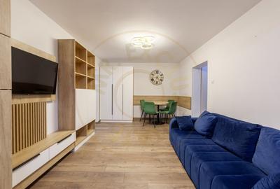 Apartament cu 3 camere semidecomandat, mobilat în Calea București - 1