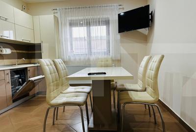 Casa spatioasa cu 5 dormitoare, doua bucatarii si teren de 1 - 1