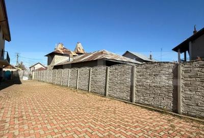 Casă cu 9 camere cu Teren 1000 Mp în Comișani - 3