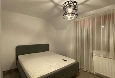 Apartament de vanzare cu 3 camere pe 2 nivele cu foisor si garaj