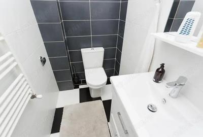 Apartament cu 2 camere decomandat în Tractorul