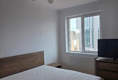 Apartament cu 2 camere circular, mobilat în P-ța Romană - 1