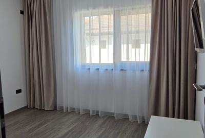 Apartament cu 3 camere decomandat, mobilat în Tunari - 11