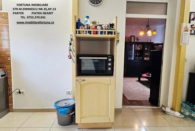 Locuinta individuala(apartament 4 camere)+spatiu comercial si teren ,Darmanesti - 4