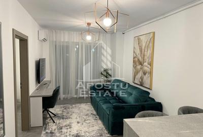 Apartament cu 2 camere semidecomandat, mobilat în UTA