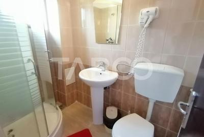 Pensiune 13 camere 16 bai sauna piscina si teren 1565 mp Cisnadioara - 19