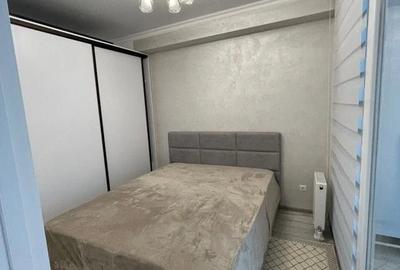 Garsonieră decomandată în Titan