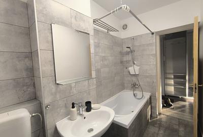 Apartament cu 2 camere semidecomandat, mobilat în Titan