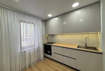 Garsonieră decomandată în Titan