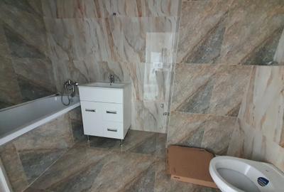 Apartament cu 2 camere decomandat în Bucium - 12