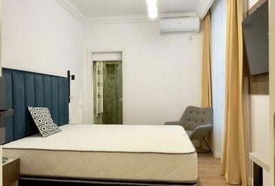 Magheru: 5 camere cu băi proprii - business regim hotelier care deja produce. - 17