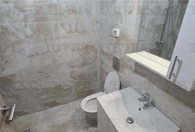 Garsonieră decomandată în Central - 9