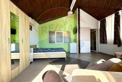 Casă cu 12 camere cu Teren 300 Mp în Central - 12