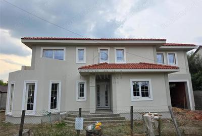 Casa individuala superba - teren 730 mp - garaj - 5 dormitoare - living 57mp. - 1