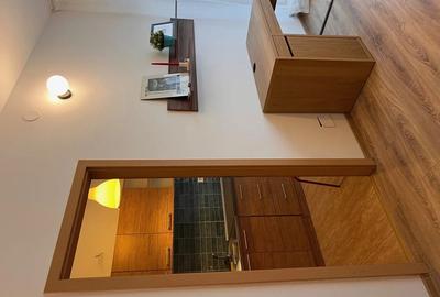 Garsonieră decomandată în Titan