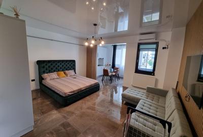 Apartament cu 2 camere semidecomandat, mobilat în Central