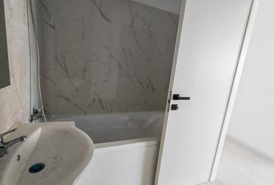 Apartament cu 2 camere decomandat în Popești-Leordeni - 4