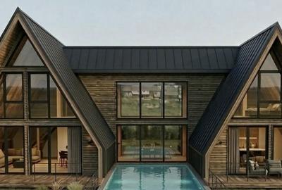 Casă cu Teren 1998 Mp în Mărișel