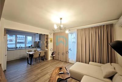 Apartament cu 4 camere decomandat în Tractorul