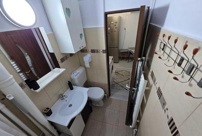 Garsonieră decomandată în Central - 7