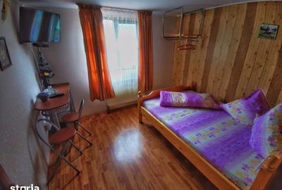 Casă cu 7 camere cu Teren 499 Mp în Tulnici - 1