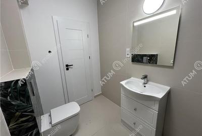 Apartament cu 3 camere si 2 bai la etajul 1pe Calea Surii Mici - 18