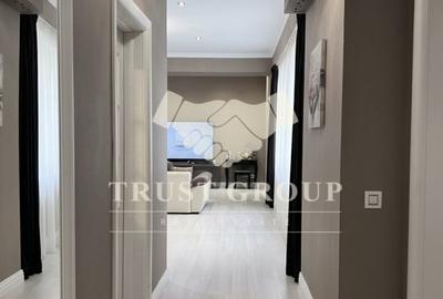 Apartament cu 3 camere semidecomandat, mobilat în P-ța Dorobanți - 1