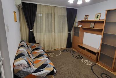 Apartament cu 2 camere semidecomandat, mobilat în Podu Roș