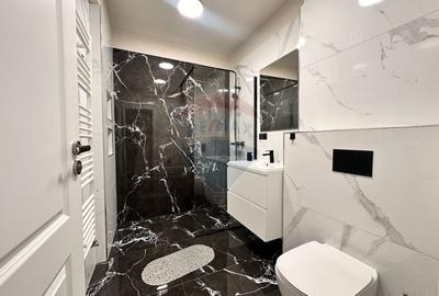 Apartament ultrafinisat, Central, 3 camere,74mp, 2 bai, garaj subteran - 10