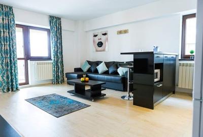 Apartament cu 2 camere semidecomandat, mobilat în Central