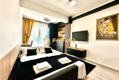 Apartament cu 2 camere semidecomandat, mobilat în Central