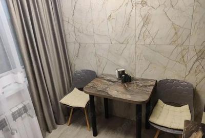 Garsonieră decomandată în Titan